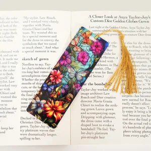 Translucent acrylic bookmark with colorful butterfly flower design and golden tassel.