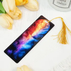 Stained glass dragon pattern acrylic bookmark with golden tassel, detailed close-up view.