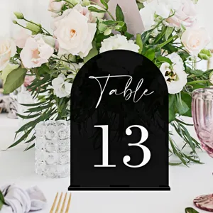 Black acrylic wedding table number sign with stand, modern arched desk decor for party