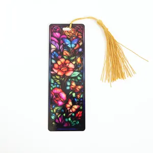 Beautiful translucent acrylic bookmark with colorful floral butterfly pattern and gold tassel.