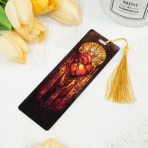 Acrylic stained glass heart bookmark with yellow tassel, artistic stationery detail view.