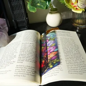 Creative translucent stained glass acrylic bookmark with floral pattern and elegant tassel.