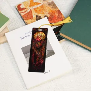 Stained glass style acrylic bookmark with golden tassel, vintage gothic reading accessory.