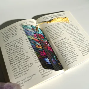 Colorful translucent acrylic bookmark with gold tassel, stained glass floral reading page marker.
