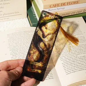 Translucent acrylic bookmark with dragon pattern and gold tassel, ideal for book lovers.