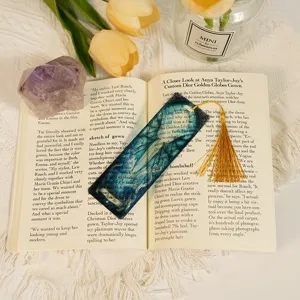Translucent acrylic bookmark with dragon pattern and gold tassel elegant reading accessory