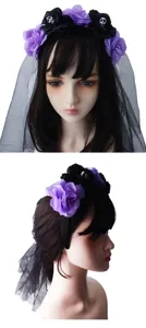 Detail shot of Gothic Halloween skull and purple black rose headband with black mesh veil.