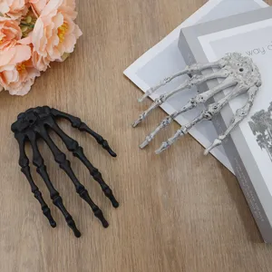 Halloween skeleton hand props, plastic scary claw decorations for party decor and spooky themes.