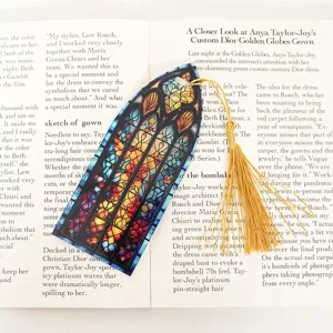 Colorful translucent stained glass style acrylic bookmark featuring a luxury golden tassel.