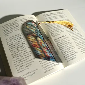 Creative colorful translucent acrylic bookmark with golden tassel for reading lovers.