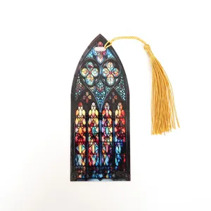 Stained glass acrylic bookmark detail, transparent gothic window design with a golden tassel.