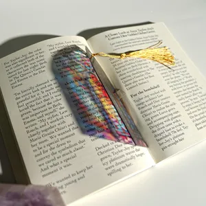 Transparent refractive acrylic bookmark with gold tassel, colorful optical light-transmitting effect