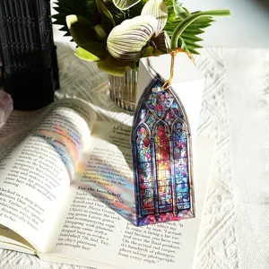 Detailed view of translucent acrylic bookmark featuring colorful stained glass design.