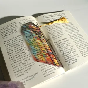 Creative colorful translucent acrylic bookmark with gold tassel, beautiful refractive design.