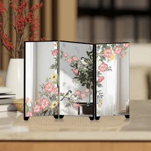 Desktop mini folding mirror screen with elegant floral and bird pattern for home decoration.