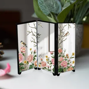 Miniature desktop folding screen with traditional Chinese floral and bird art print detail.