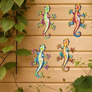Detail shot of colorful metal gecko wall art, vibrant hand-painted outdoor garden decor.