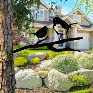 Metal garden bird silhouette stake for outdoor yard tree decoration, durable black finish.