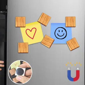 Detailed view of wood grain magnetic fridge stickers holding notes on metal surface.