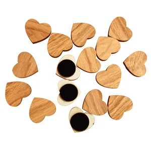 Closeup of wooden heart magnets showing natural wood grain texture and magnetic backing.