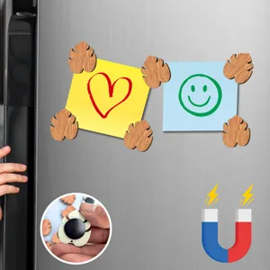 Wooden leaf fridge magnet detail showing the strong magnetic back and sticky note holding scene.