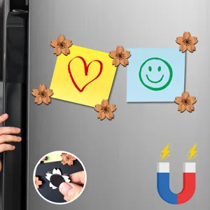Detailed close-up view of wooden cherry blossom magnetic fridge sticker holding notes.