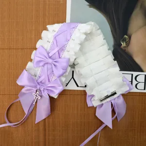 Leuke Lolita strik haarspeld met wit kant en kruis hanger, hoofdaanzicht, mode accessoire.