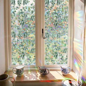 Decorative window film with eucalyptus pattern and rainbow prism effect for home privacy.