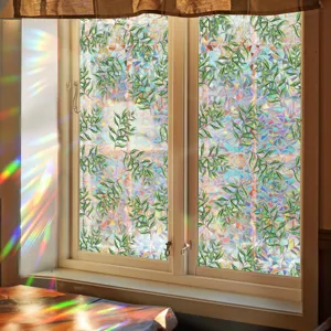 Decorative static window film with rainbow prism green leaf design for privacy and light effect.
