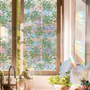 Decorative prismatic window film with iridescent leaf pattern and rainbow light effect.