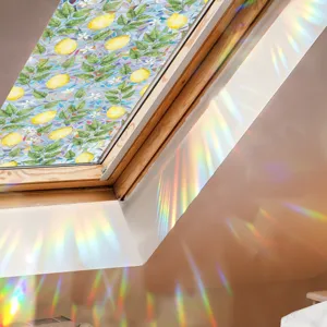 Decorative stained glass window film with lemon pattern creates stunning rainbow light effects in room.