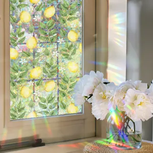 Decorative lemon pattern window film with prism rainbow sun catcher effect for home glass decor.