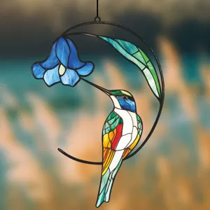 Stained glass hummingbird suncatcher detail hanging ornament for window wall decor aesthetic.