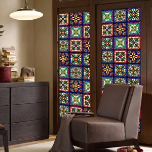 Stained glass window film detail showing colorful retro floral static cling design for home.