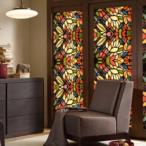 Detailed view of stained glass window film in a retro floral pattern creating privacy.