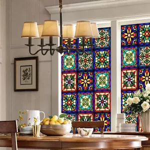 Colorful retro stained glass window film detail showing vibrant floral patterns on glass.