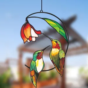 Stained glass hummingbird window hanging detail view, beautiful colorful floral wall decor.