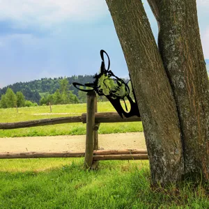 Metal garden tree peeking animal stake outdoor yard art decoration fine detail view.