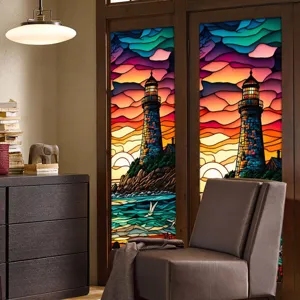 Stained glass window film detail showing vibrant lighthouse sunset design on glass door.
