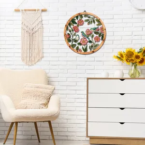 Wooden frame metal flower bird wall hanging scene detail, elegant home decor living room accent.