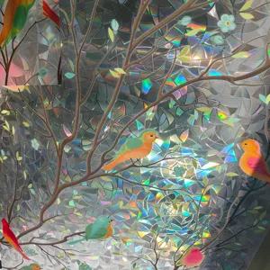 Detailed view of colorful rainbow window film with bird and tree pattern, static cling glass sticker.