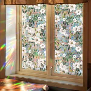 Static decorative window film with magnolia floral pattern and colorful prism rainbow light effect.