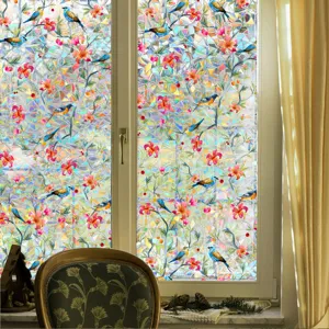 Colorful stained glass window film detail showing prism rainbow static floral and bird pattern sticker.