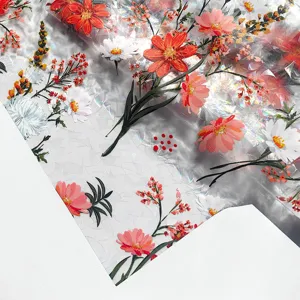 Prism rainbow window film detail showing colorful floral pattern and light refraction texture.