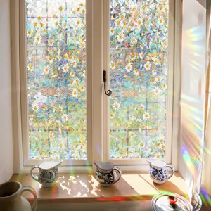 Rainbow window film with daisy mosaic pattern, prismatic suncatcher glass sticker for home decor.
