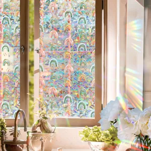 Rainbow window film detail showcasing iridescent glass sticker with prismatic light effects on glass.
