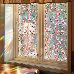 Close-up scene showing vibrant floral window film with beautiful rainbow prism light effects.