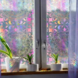 Colorful suncatcher window film with prismatic rainbow mandala design for home glass decor.