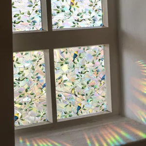 Decorative suncatcher window film featuring colorful prism rainbow effect for home glass.