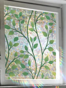 Suncatcher window film static clinging decorative glass sticker with green vine prism rainbow effect.